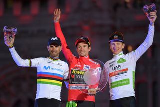 Pogacar (right) on the final Vuelta podium with overall winner Primoz Roglic (centre) and second-placed Alejandro Valverde.