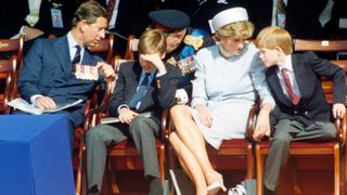 Prince Charles, Prince of Wales, Prince William, Princess Diana and Prince Harry attend a ceremony in Hyde Park to mark the 50th anniversary of VE Day on May 7, 1995 in London, England.