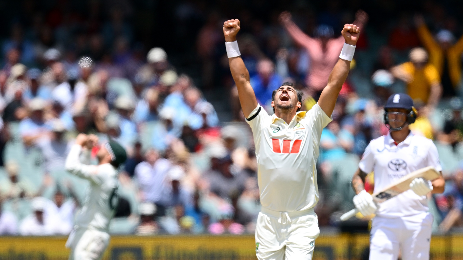 Australia's Mitchell Starc celebrates taking the wicket of England's Will Jacks during The Ashes 2025/26
