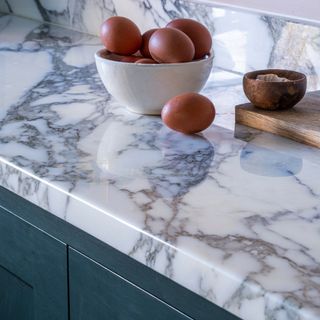 bowl of eggs on a marble kitchen worktop