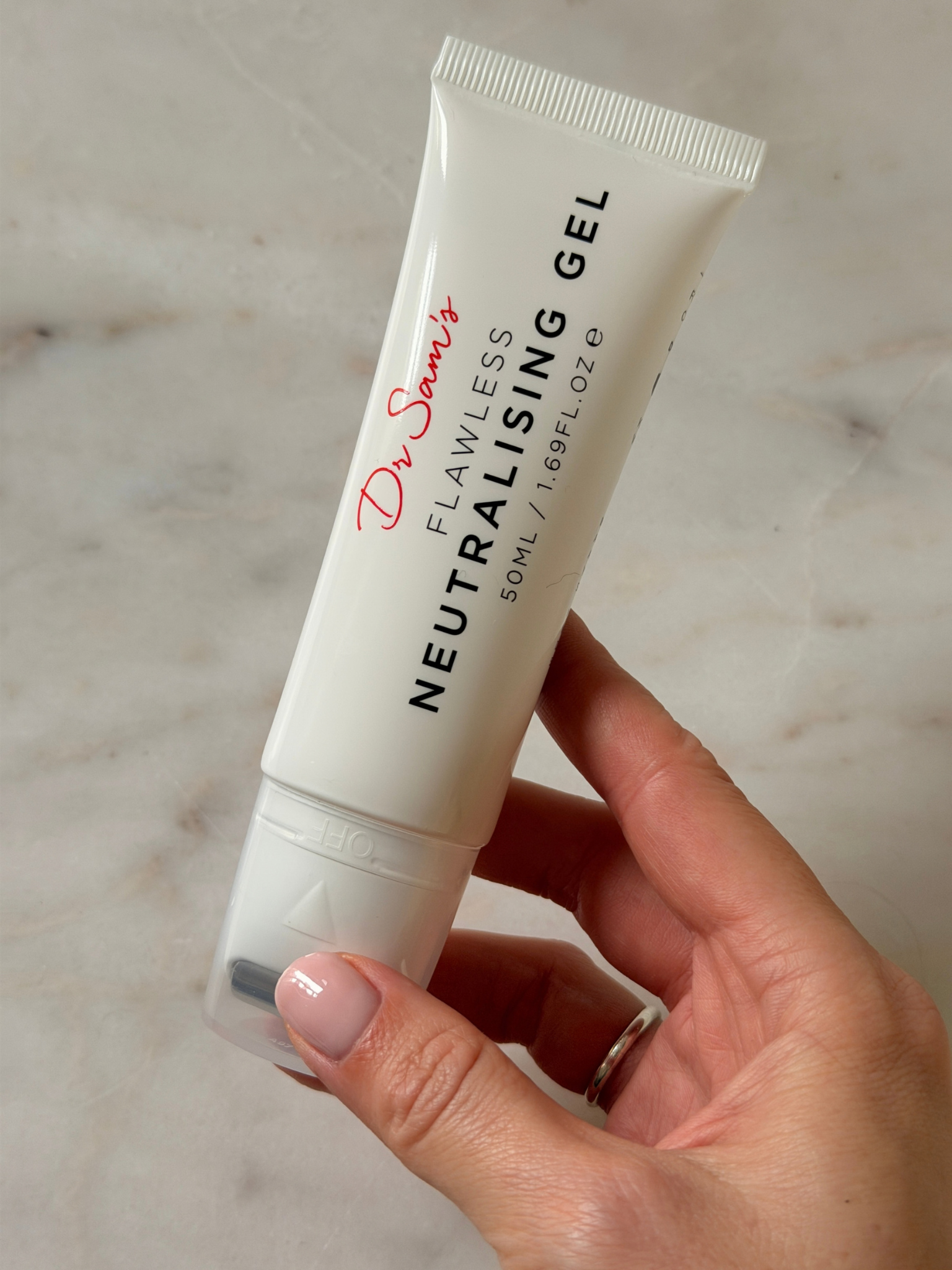 Freelance beauty editor Grace Day holding the Dr. Sam's spot treatment