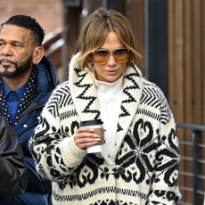 Jennifer Lopez are seen on December 26, 2024 in Aspen, Colorado wearing an oversized Fair Isle cardigan sweater from Ralph Lauren.