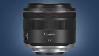 The Canon RF 35mm F1.8 IS Macro STM lens on a blue background
