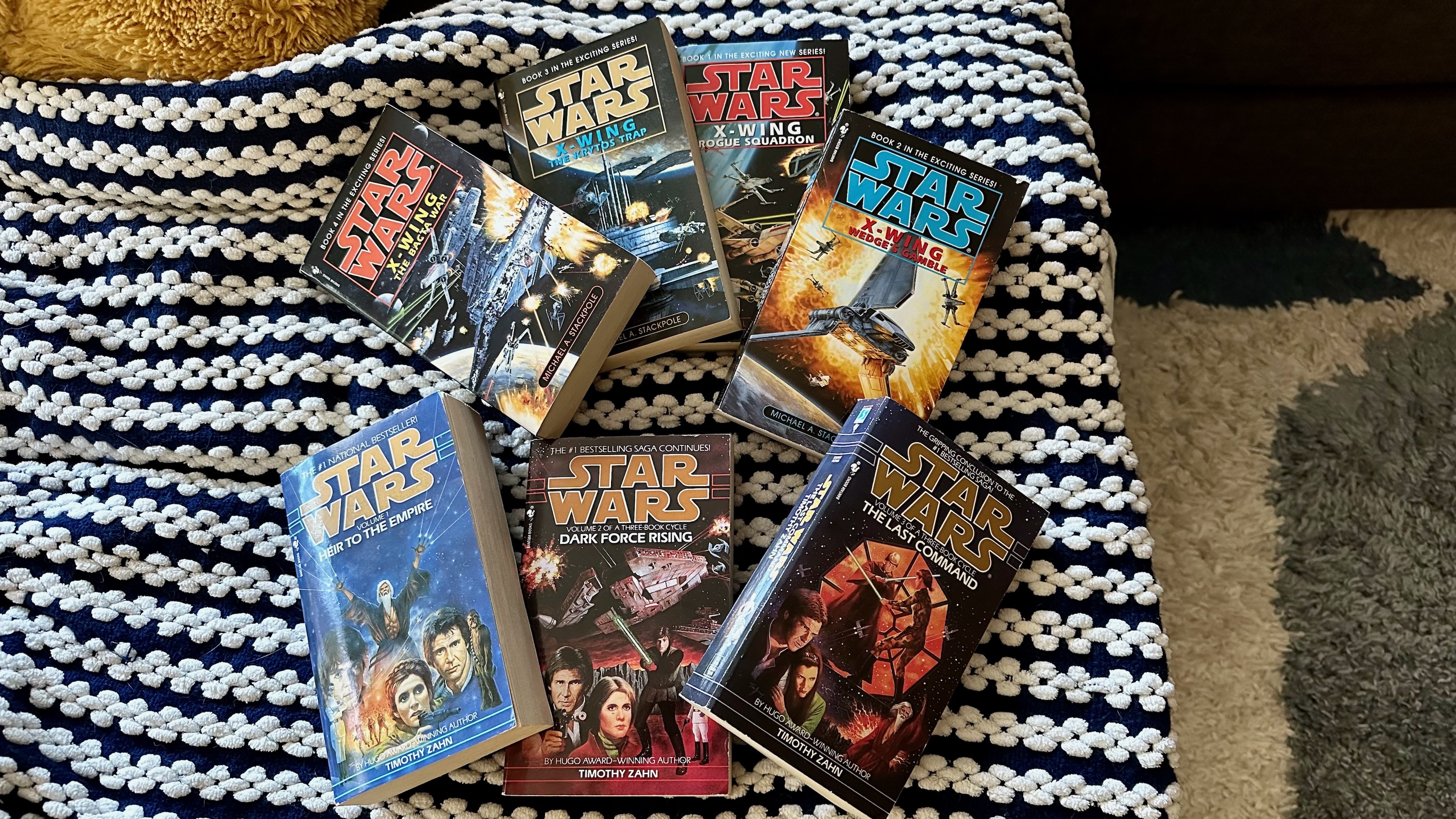 A bunch of Star Wars Legends canon books piled on one another
