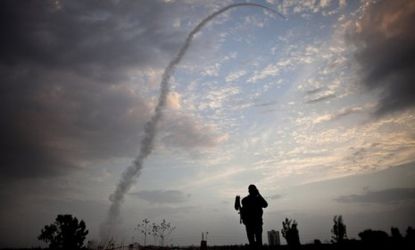 An Israeli missile from the Iron Dome defense system is launched to intercept and destroy incoming rocket fire from Gaza on Nov. 17 in Tel Aviv.