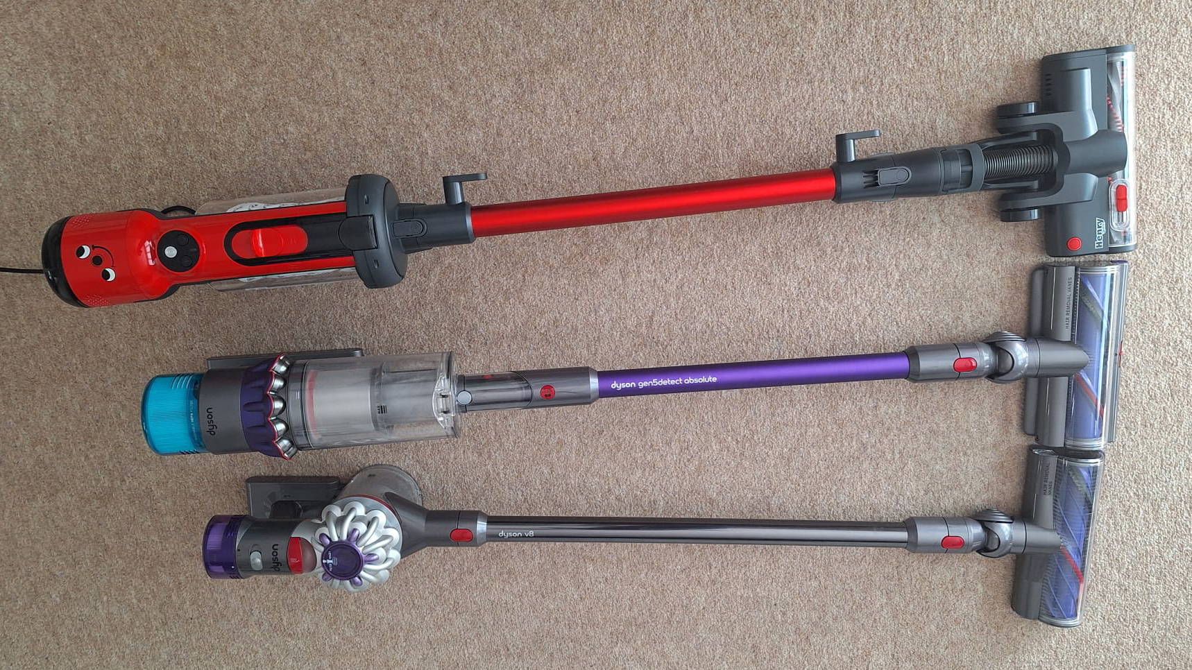 Numatic Henry Quick next to a Dyson Gen5detect and V8, to show how much bigger it is