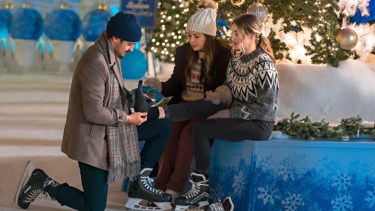 Tyler Hynes, Janel Parrish and Pascal Lamothe-Kipnes getting ready to skate in Never Been Chris&#039;d