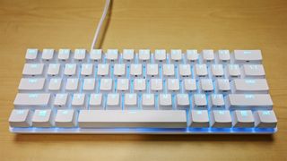 Razer Huntsman Mini unboxed in white with RGB lighting