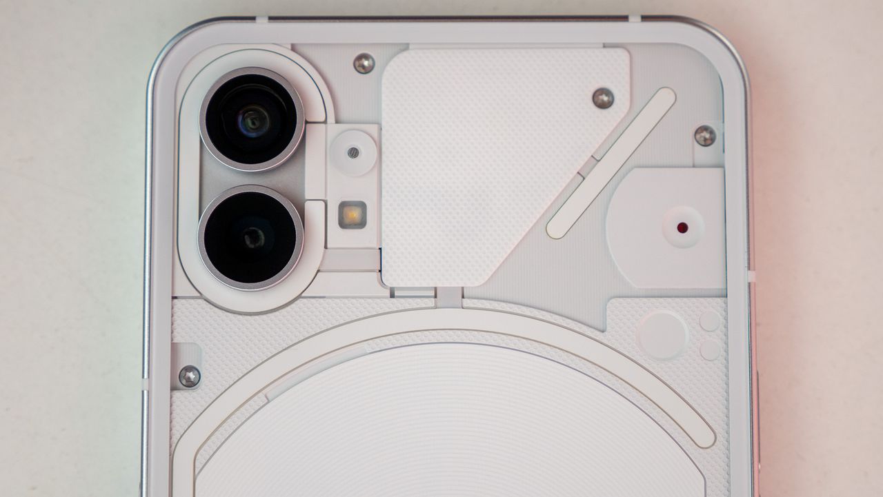Nothing phone (1) close-up of the electronics behind the phone's transparent back