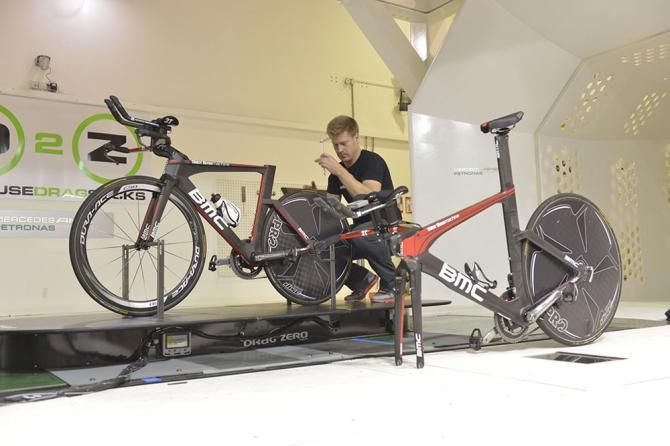 A BMC mechanic works on a number of positions for Phinney's TT bike