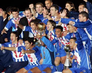 Porto players celebrate winning the 2004 Intercontinental Cup after victory against Colombian side Once Caldas.