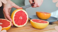 picture of woman cutting up a grapefruit to demonstrate the grapefruit cleaning hack