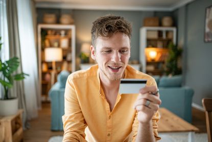Man looking at easy-access savings accounts