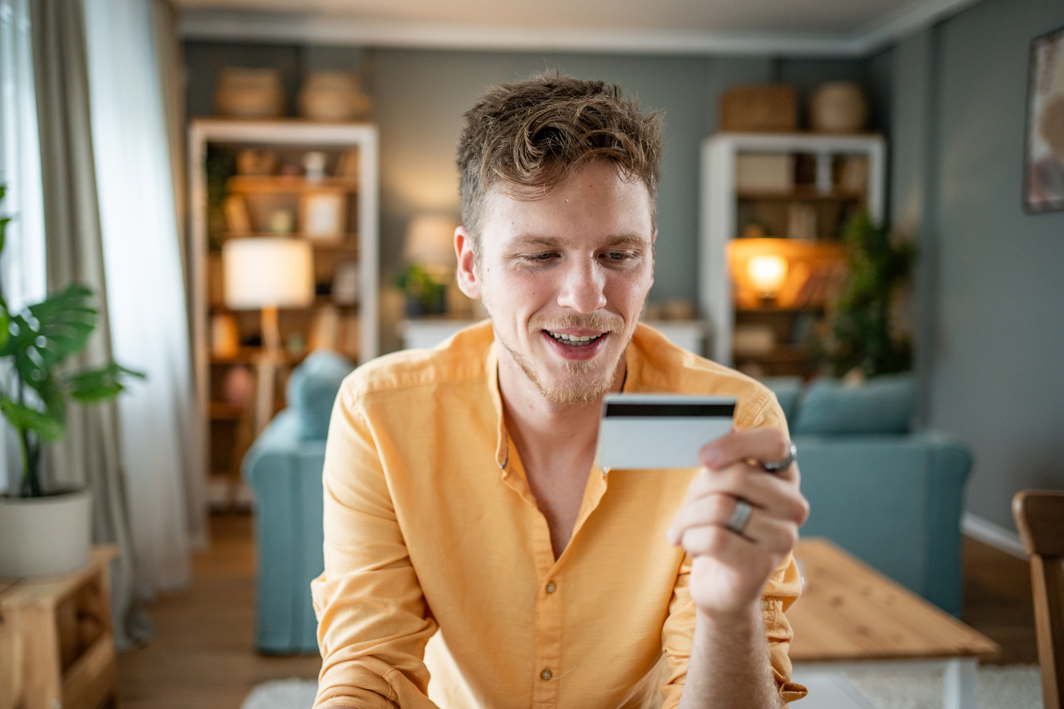 Man looking at easy-access savings accounts