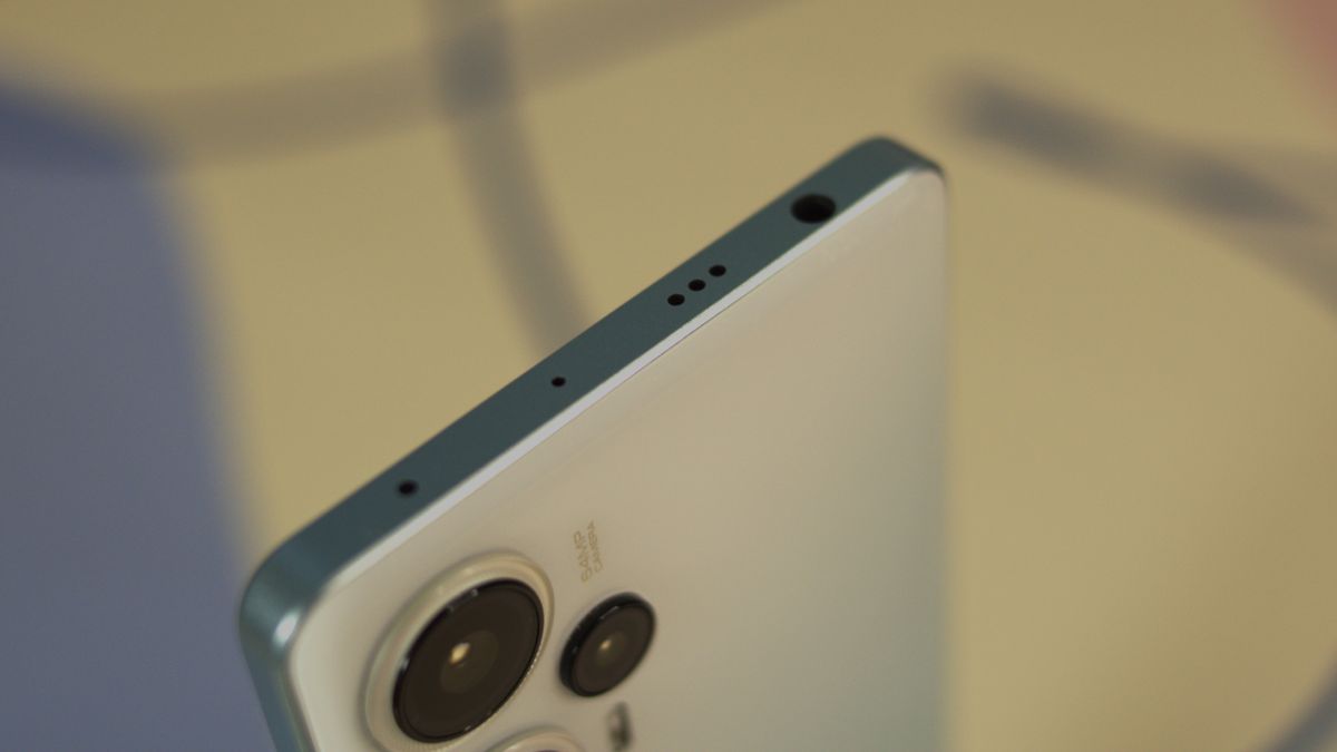 Poco F5 top side showing the mic and speaker grille