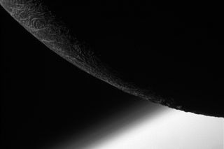 NASA's Cassini spacecraft captured this view of craggy features on the limb of Saturn's moon Enceladus during the spacecraft's final close flyby on Dec. 19, 2015.
