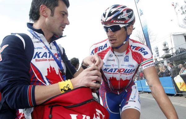 Filippo Pozzato needs a drink after a tough finish