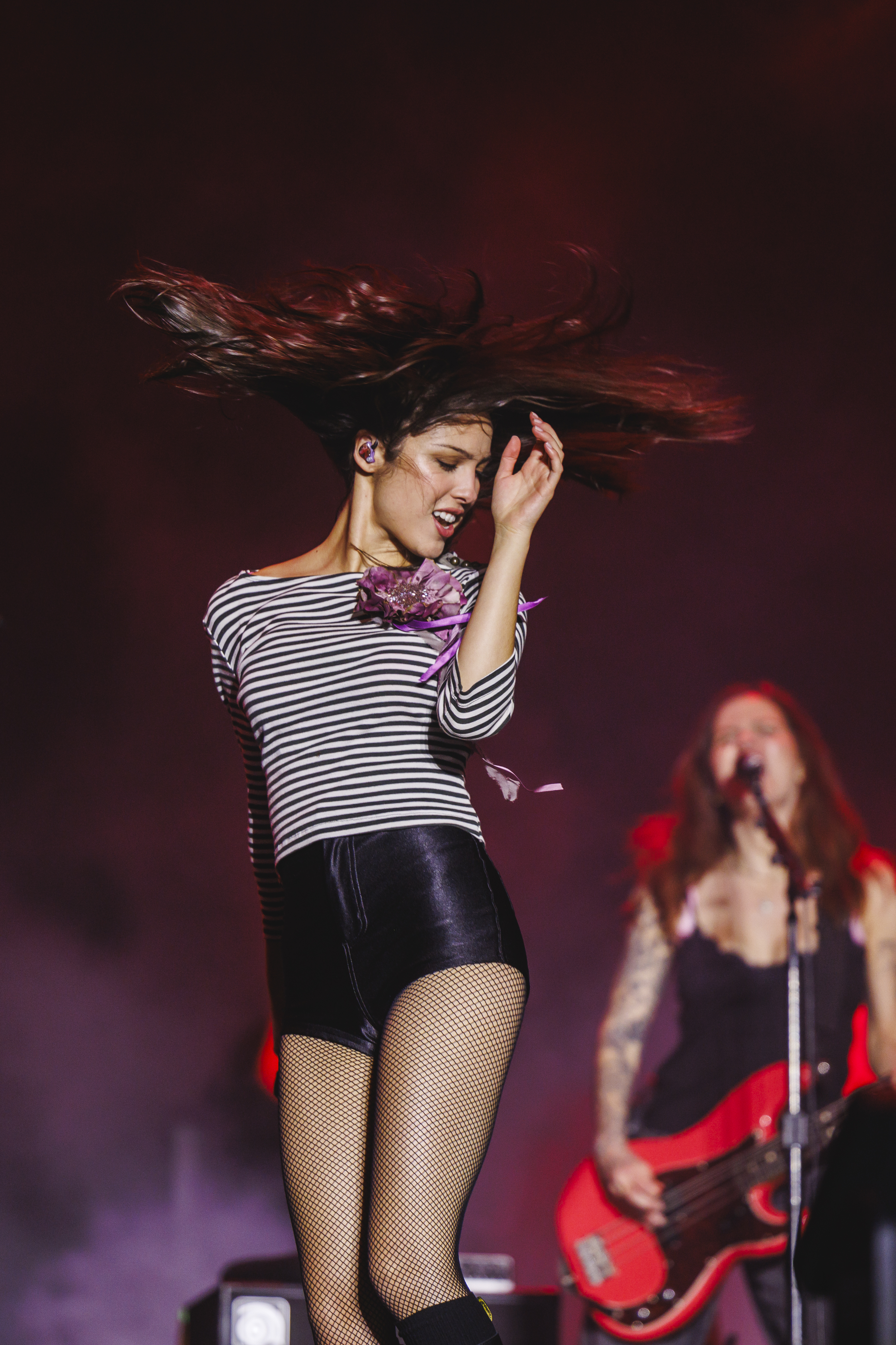 Olivia Rodrigo performs during Primavera Sound 2026 at Parc Del Forum in Barcelona, Spain on June 6, 2026 wearing black hot pants, a striped breton top, and knee-high Dr Martens boots