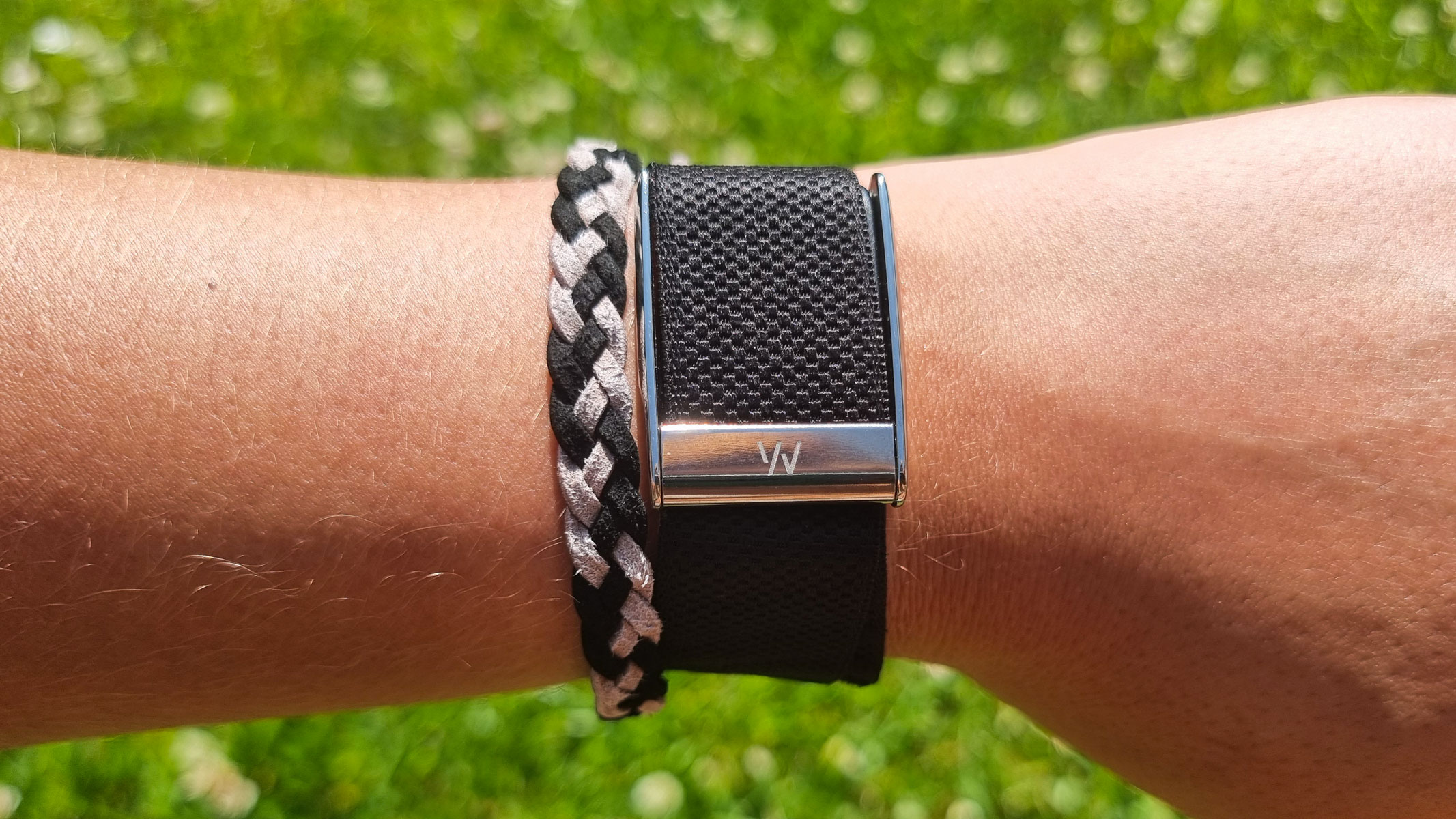 A close-up picture of our reviewer wearing the Whoop MG fitness tracker