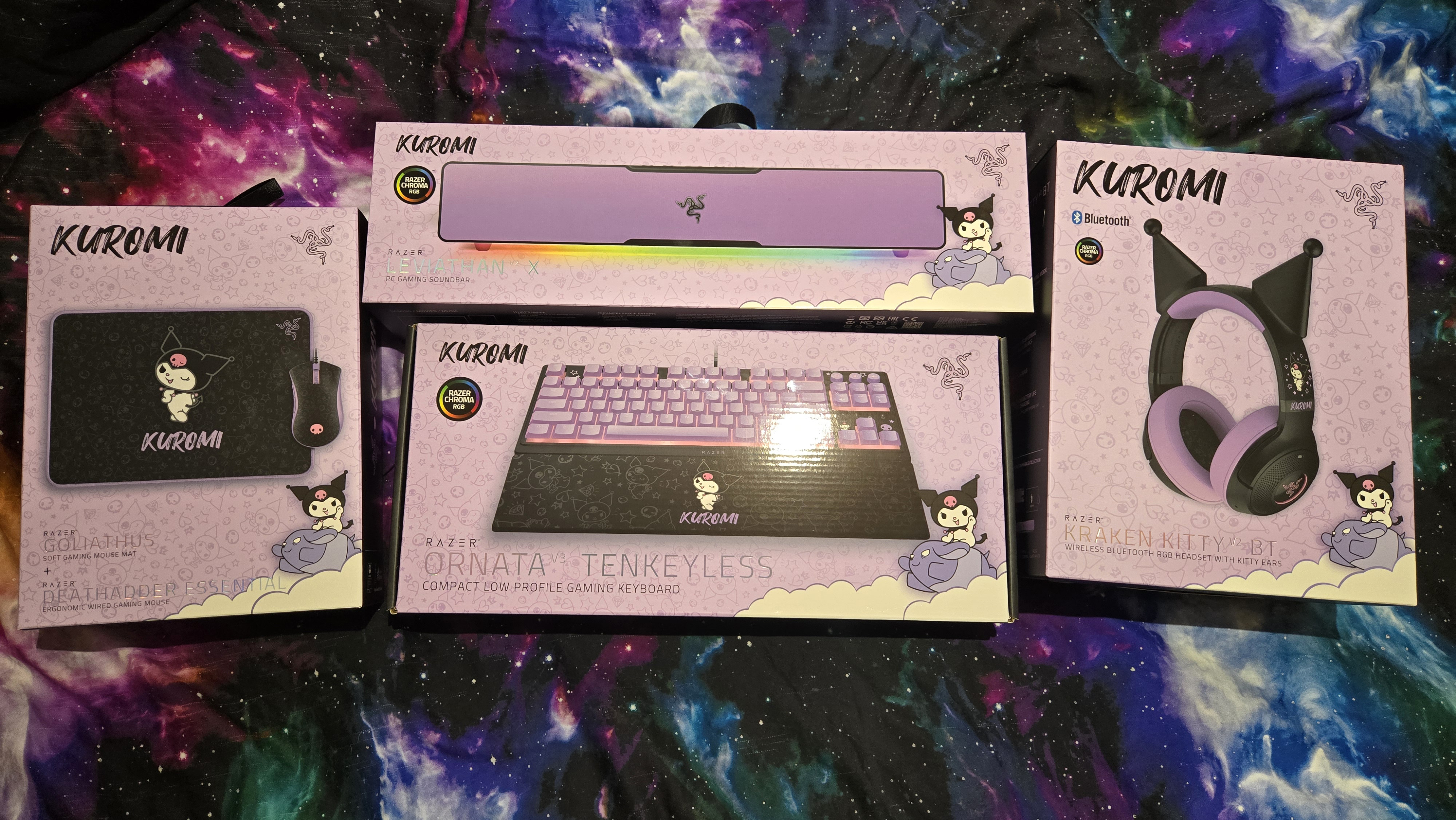 Razer | Kuromi collection peripherals laid out on a desk.