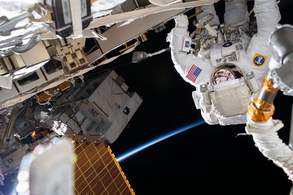 Watch two astronauts take a milestone spacewalk outside the International Space Station right now!