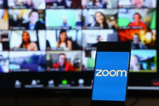 Zoom monitors in the background of a mobile device