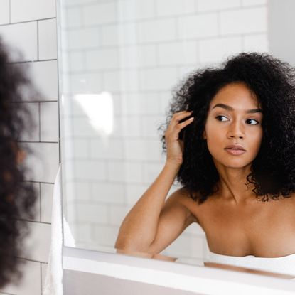 Hair, Face, Hairstyle, Black hair, Skin, Beauty, Long hair, Afro, Human, Lip, 