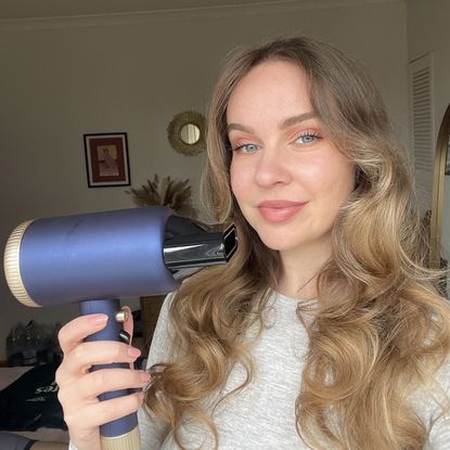 valeza holding the Aldi hair dryer