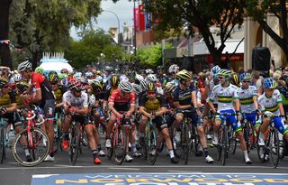 Riders wait for the start of stage four of the Tour Down Under cycling race from Norwood to Campbelltown
