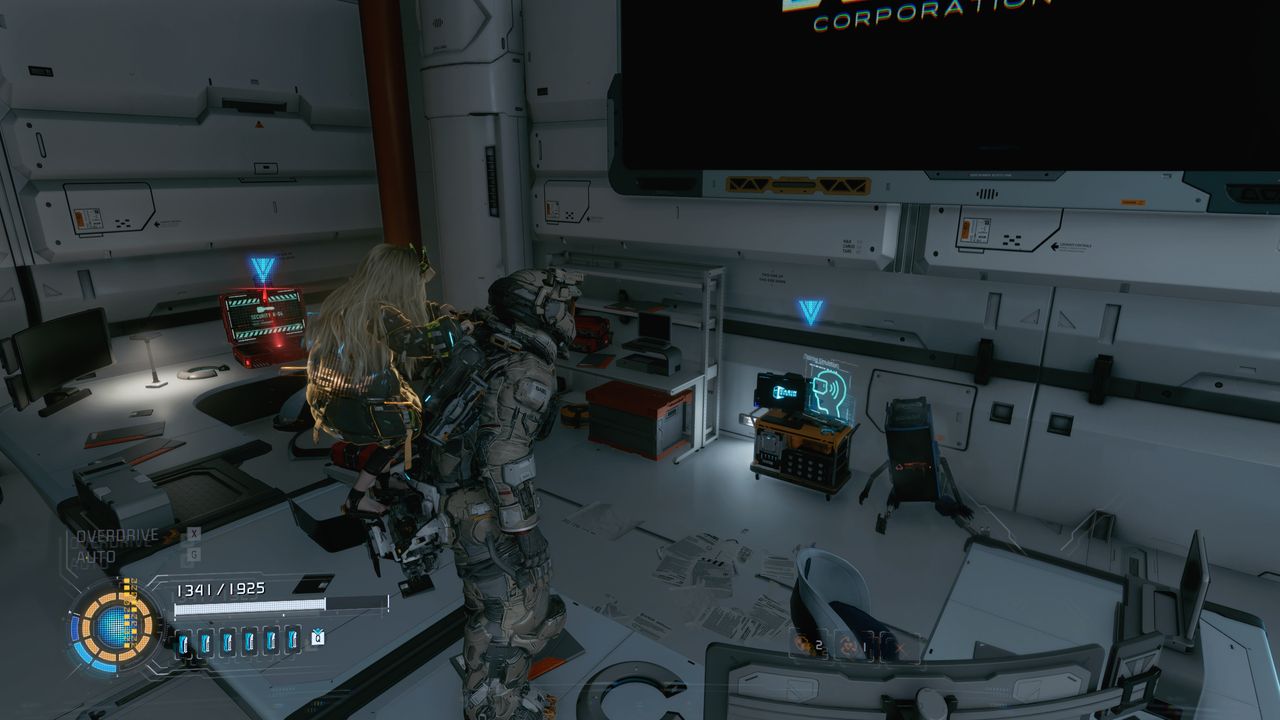 Pragmata Red Zone Gate Keys: A player looking at a Red Gate Key laptop behind a desk.