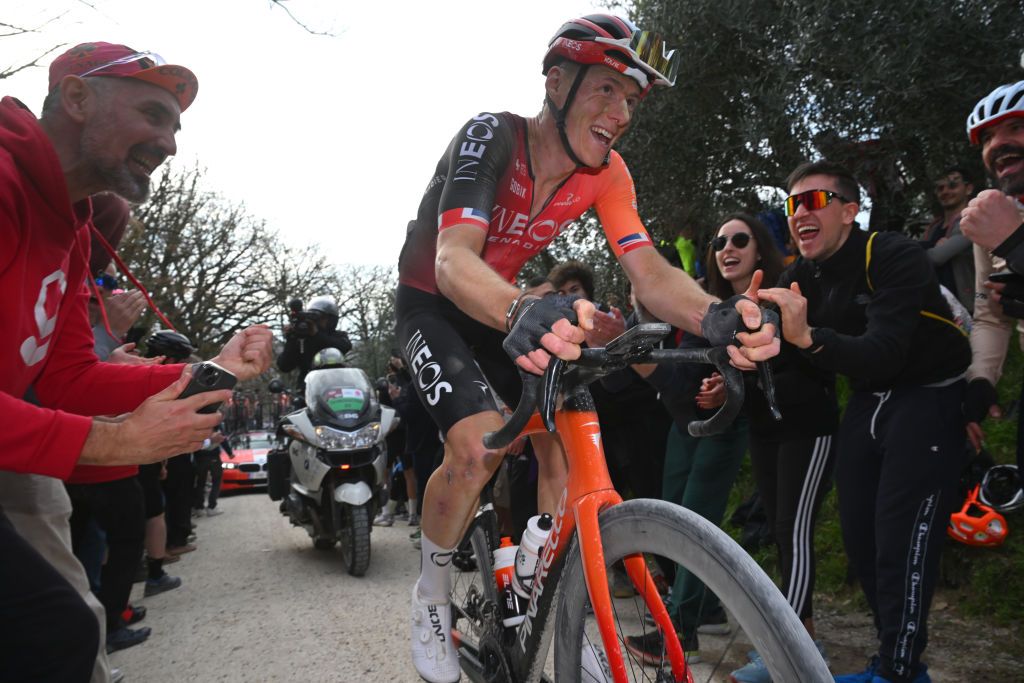 SIENA ITALY MARCH 08 Connor Swift of The United Kingdom and Team INEOS Grenadiers competes in the chase group while fans cheer during the 19th Strade Bianche 2025 Mens Elite a 213km one day race from Siena to Siena 320m UCIWT on March 08 2025 in Siena Italy Photo by Tim de WaeleGetty Images