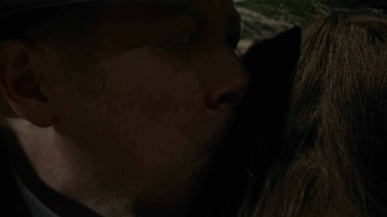 Reddingron kisses Elizabeth Keene on the head as she dies in The Blacklist