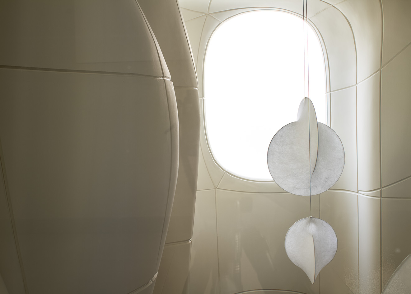 views of Pur residential recording studio, a family of structures in a cluster, made of stone and wood against blue mediterranean skies