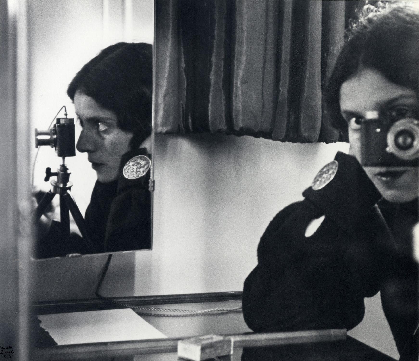 Ilse BingSelf portrait with Leica Paris 1931