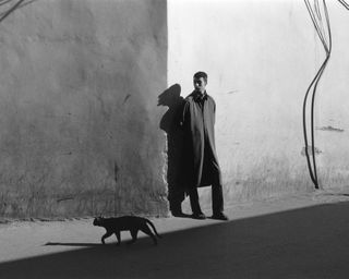 Man in black and white on Morocco street