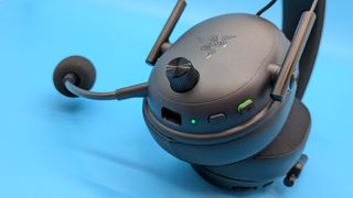 Razer BlackShark V3 gaming headset on a blue blackground