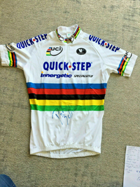 Take a look at Bettini’s signed jersey on Bay here