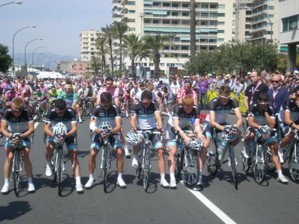 The riders bow their heads