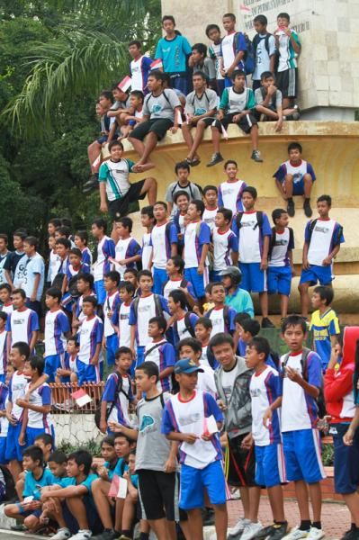Hundreds of school kids lined the route to watch the racing.