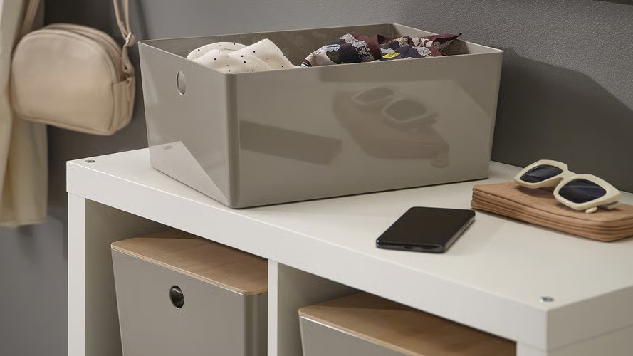 IKEA kuggis storage box on bookshelf