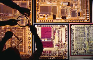 Engineers working around a light table