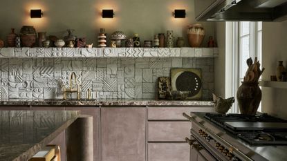 kitchen with high relief ceramic backsplash and plaster finished cupboards