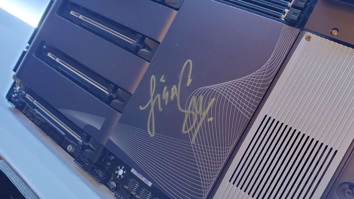 A photo of the signature of AMD's Dr Lisa Su on a Gigabyte motherboard, on display at Computex 2024
