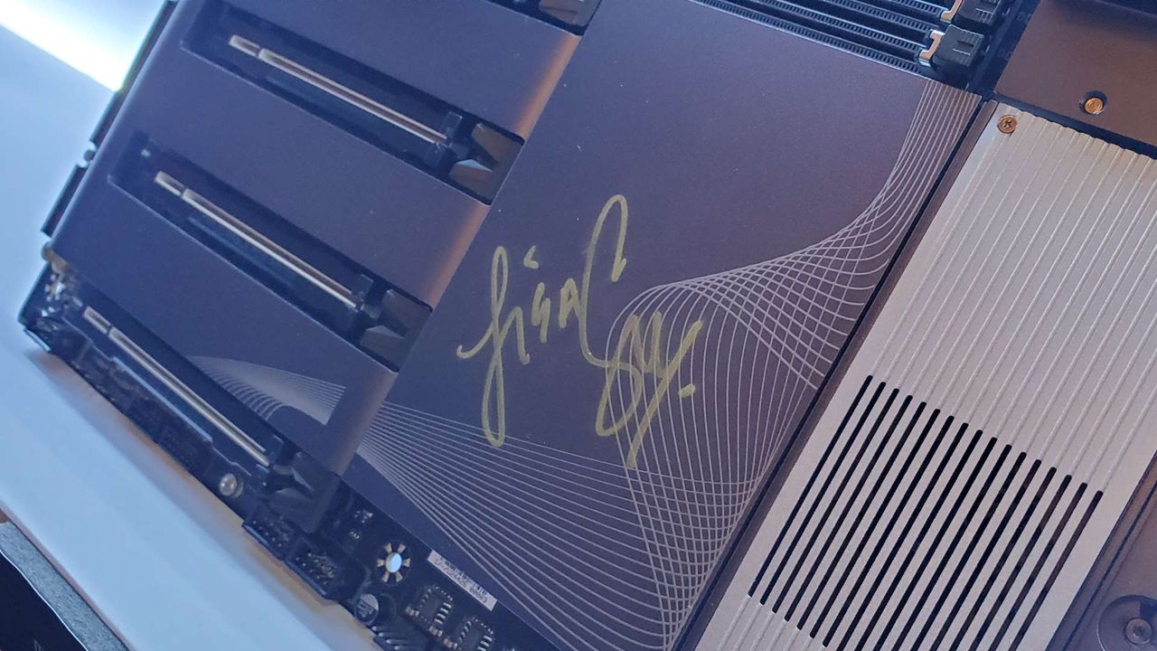 A photo of the signature of AMD's Dr Lisa Su on a Gigabyte motherboard, on display at Computex 2024