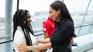 Meghan, Duchess of Sussex meets Glory Essien at the "Friends @ Home Event"