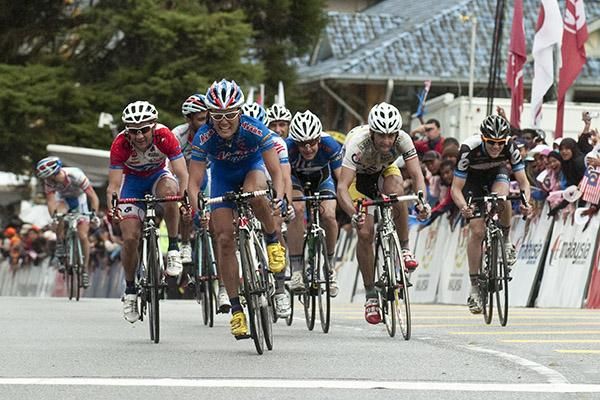 The charge to the line in the Cameron Highlands where a small group had broken clear of the peloton in the final kilometres.