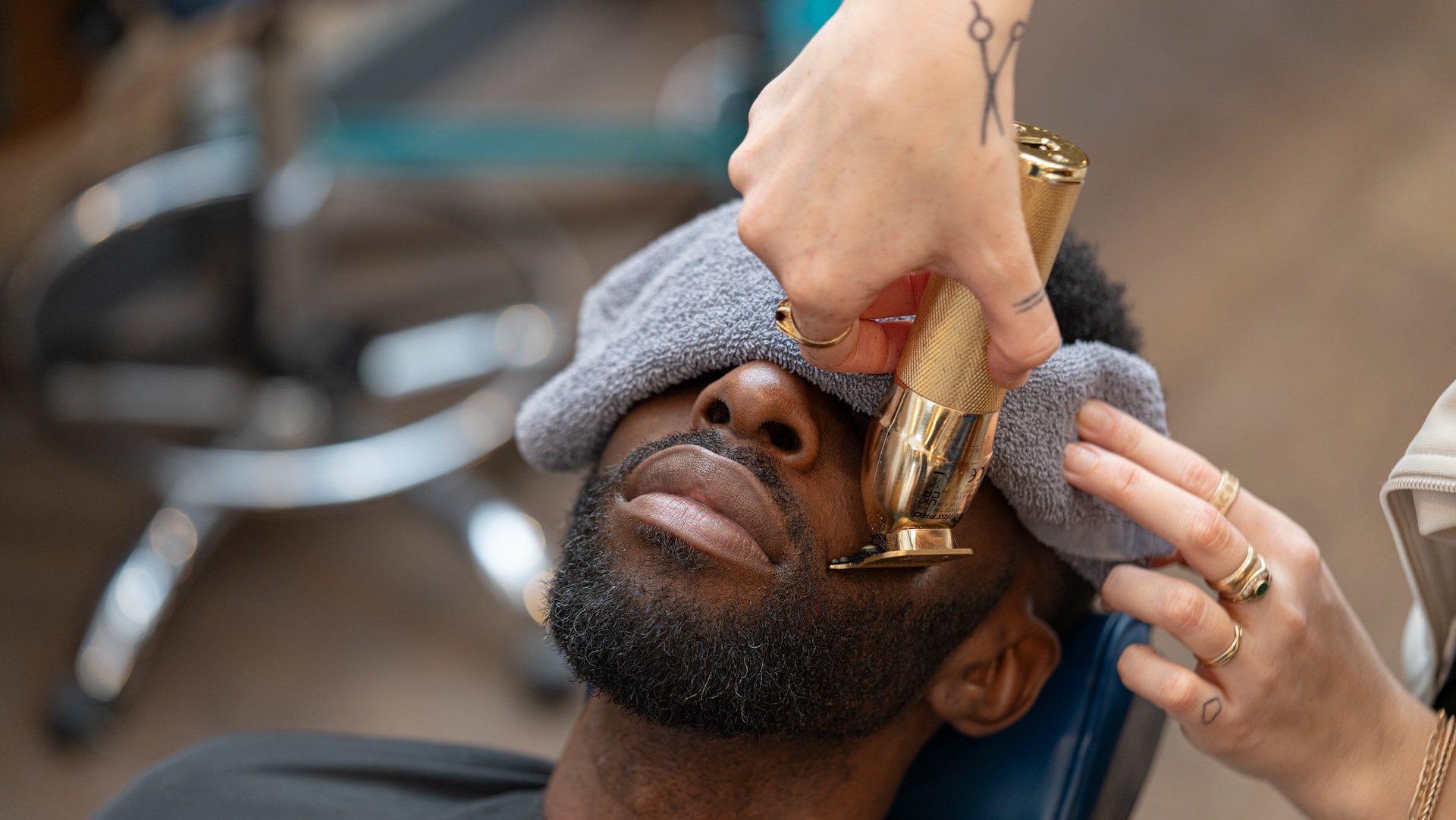 A man gets a beard trim