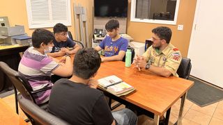 FSR opened its doors to a scout group, shown here smiling around a table, when COVID-19 took away its regular meeting place.
