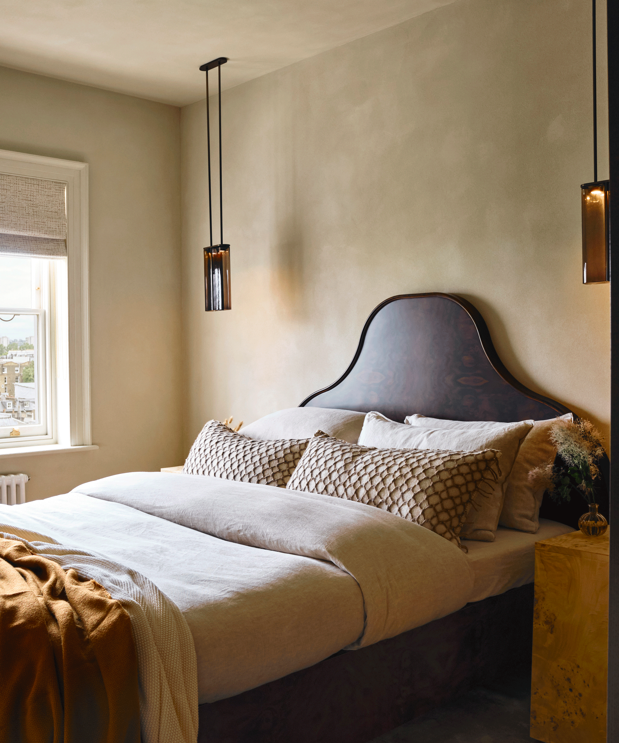 Bedroom with beige textured wall