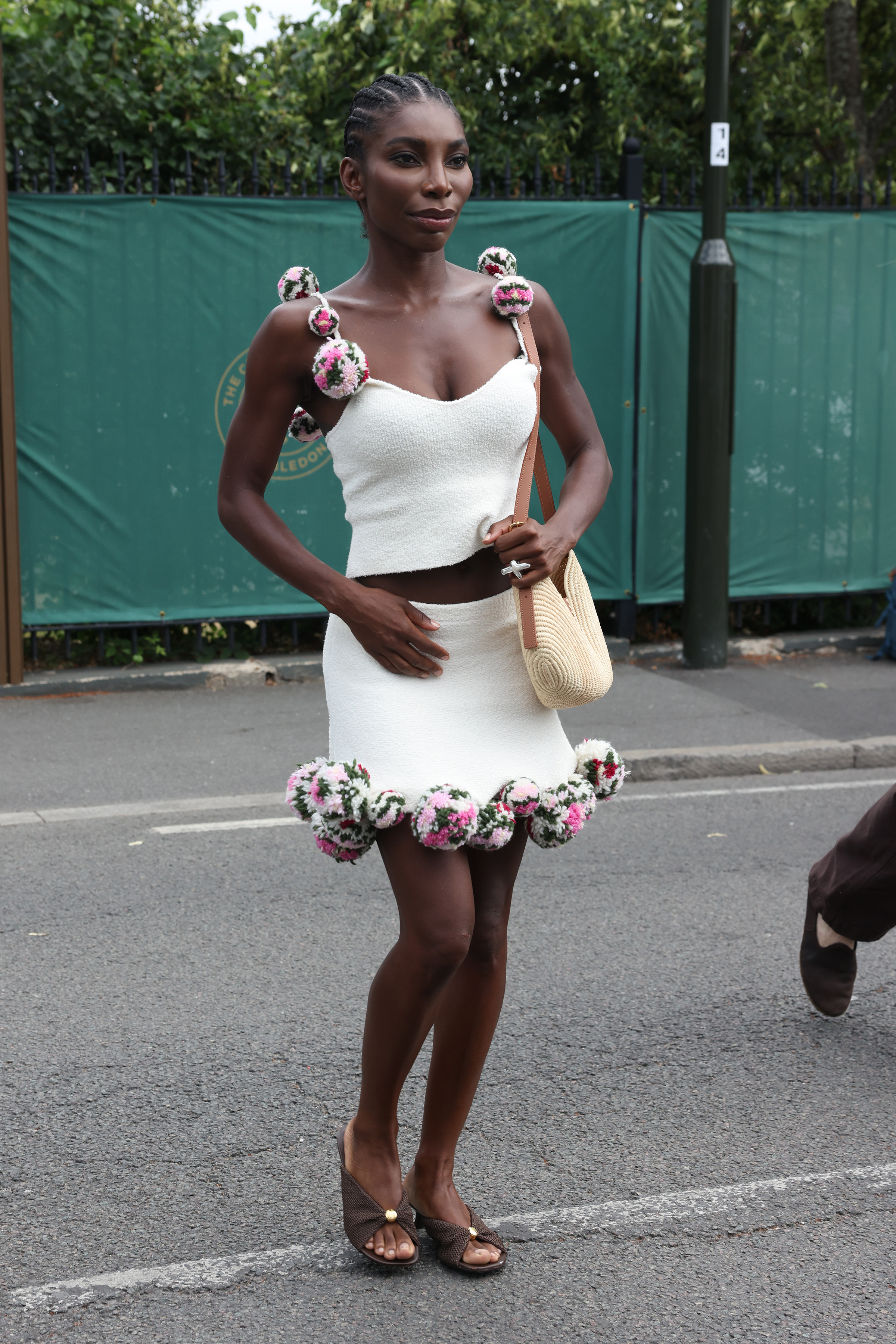 Michaela Coel attended Wimbledon 2026 in a white skirt set July 5